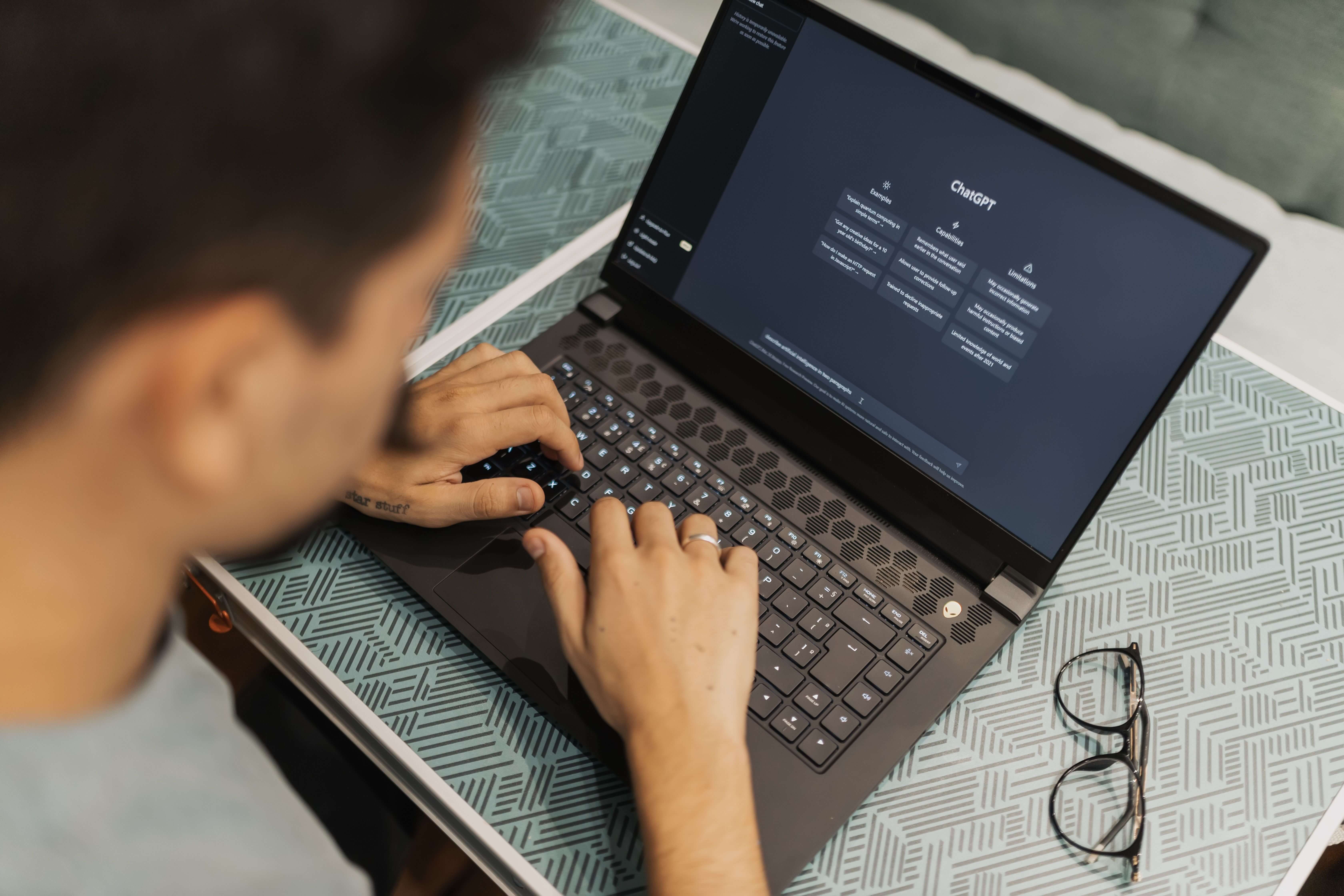 Teacher using AI ChatGPT search engine